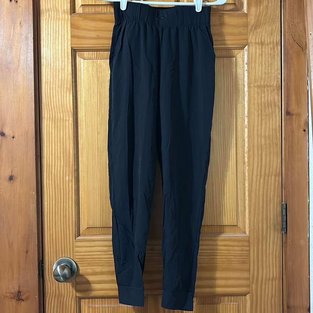 Nike dry-fit joggers in black.